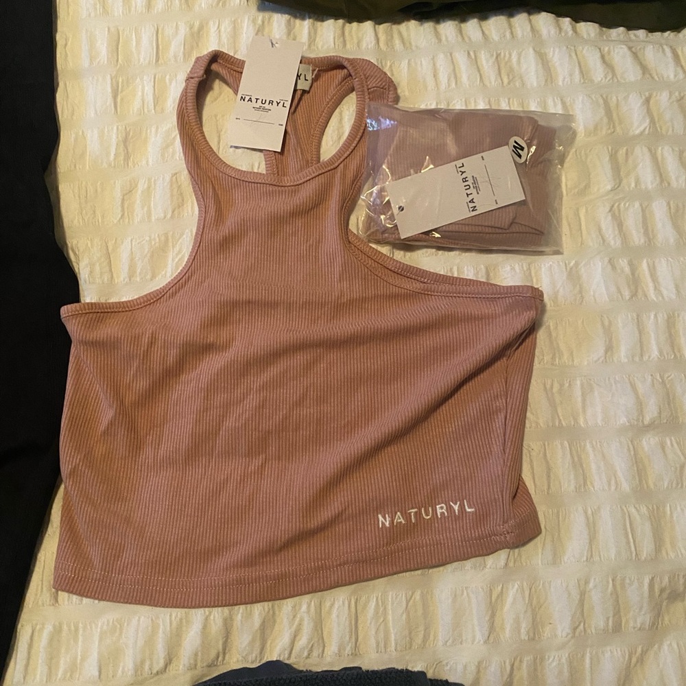 Naturyl by Niykee nude top. Size M. Two available